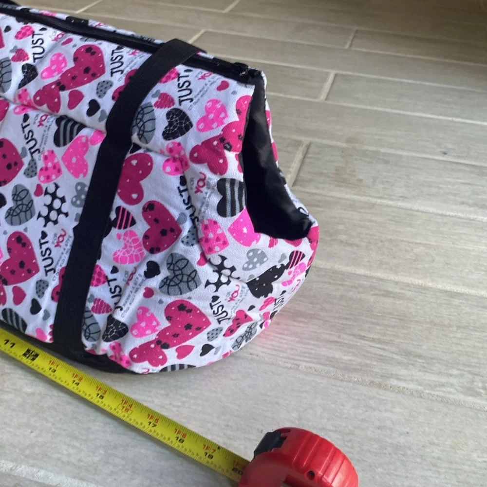 Pet Carrier.10.5”tall x 20”wide x 9”Deep. Long straps. Removable bottom. Zipper